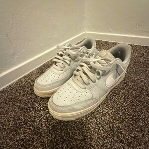 Used light gray/white Air Force ones